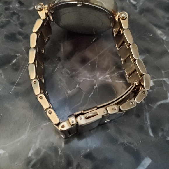 Ladies gold color MK logo watch,  rhinestone accent around dial